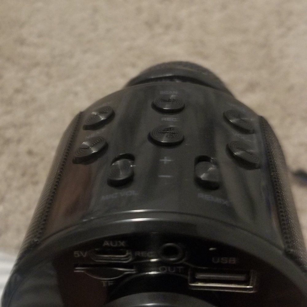 I am selling a black bluetooth microphone. (You can talk in the microphone)